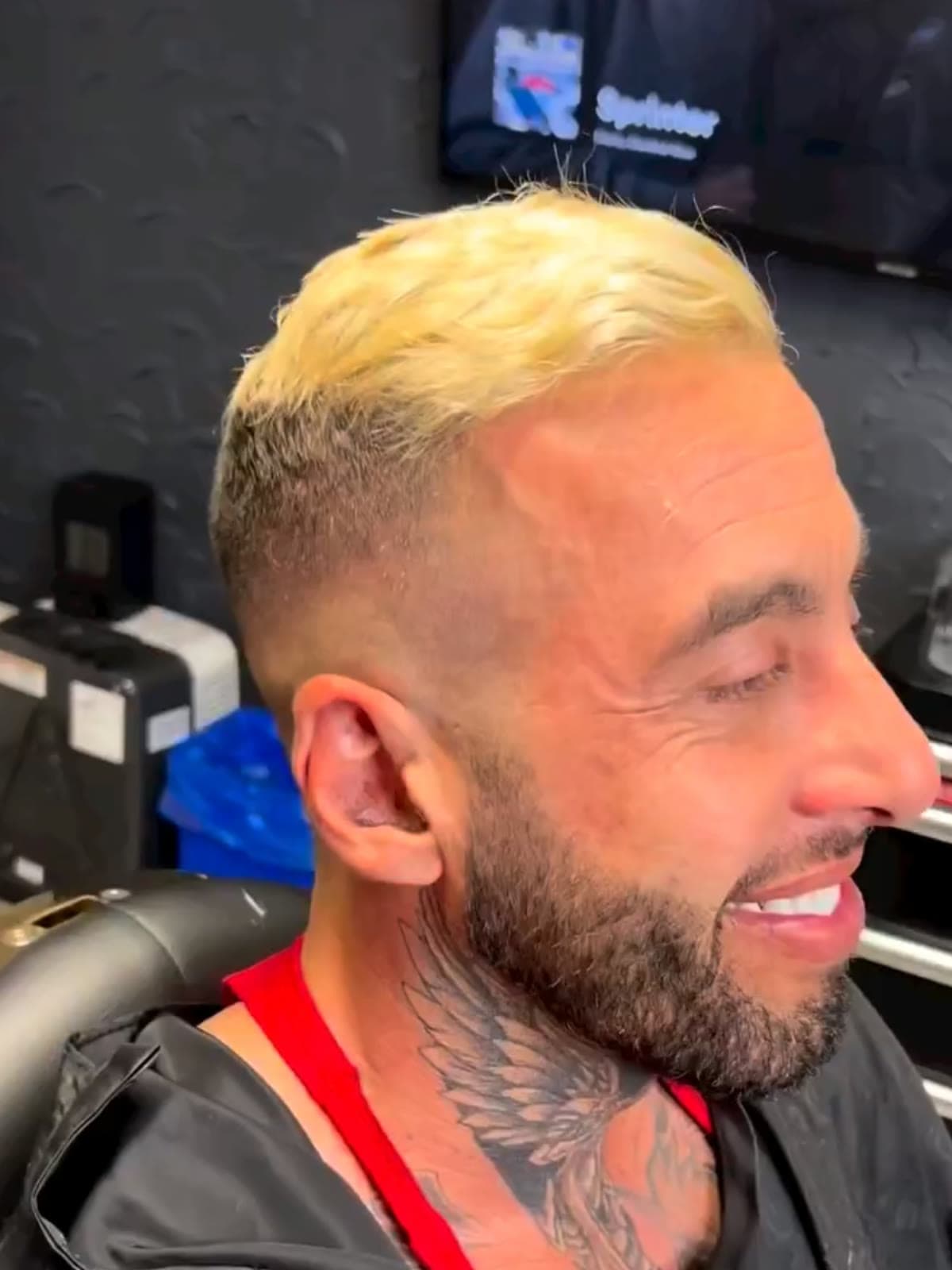 Bleached blonde crop over a faded back and sides
